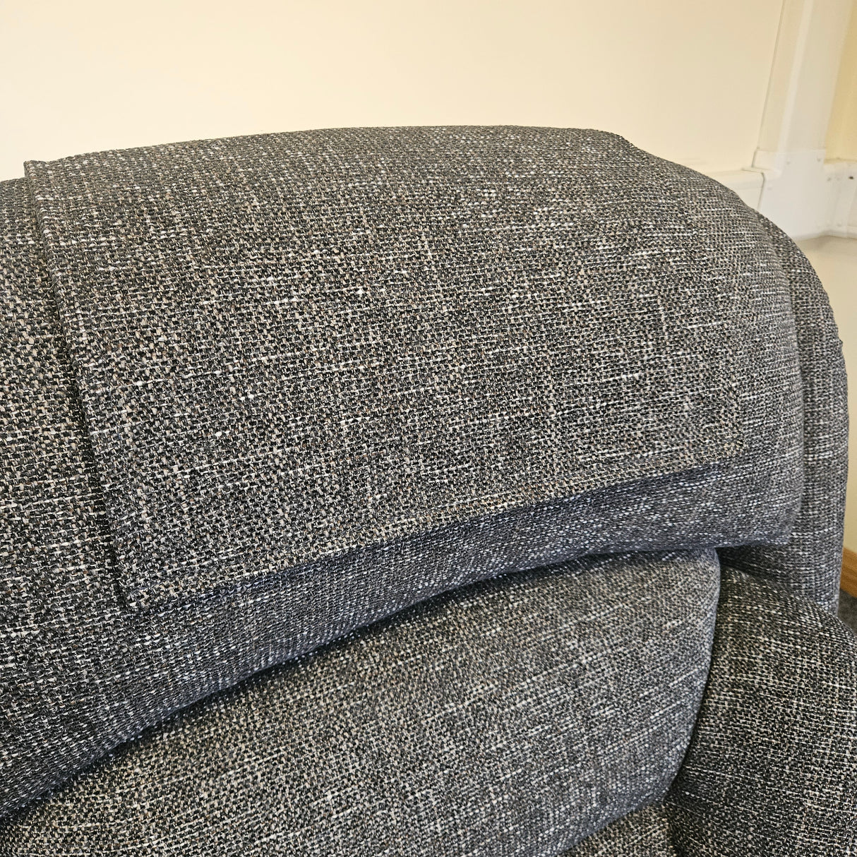 Close-up of gray textured fabric on a chair
