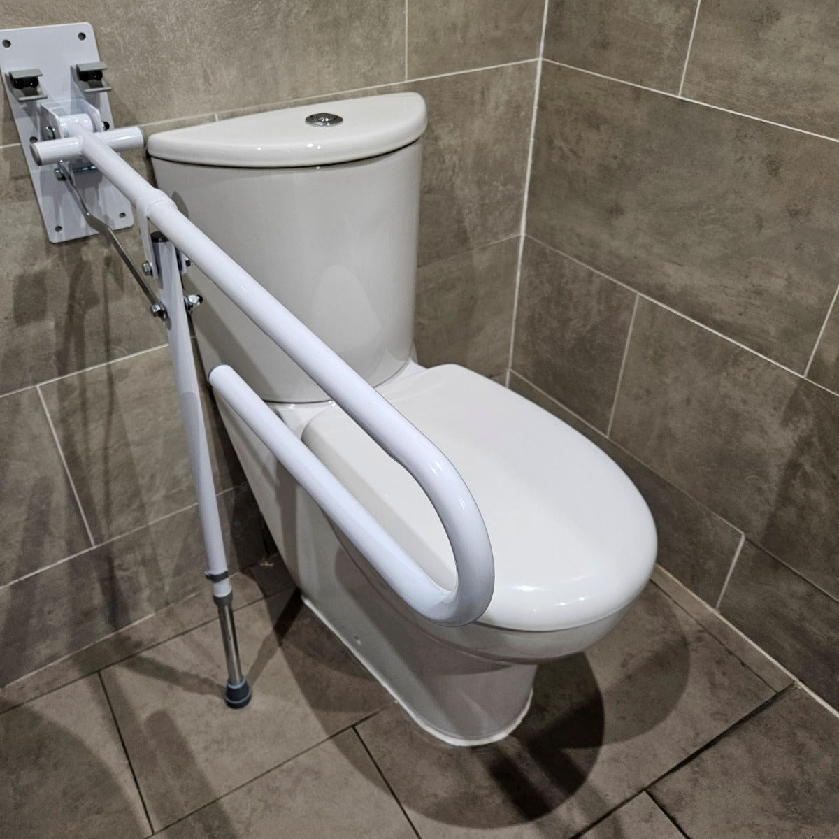 Folding drop down toilet bathroom safety rail with leg