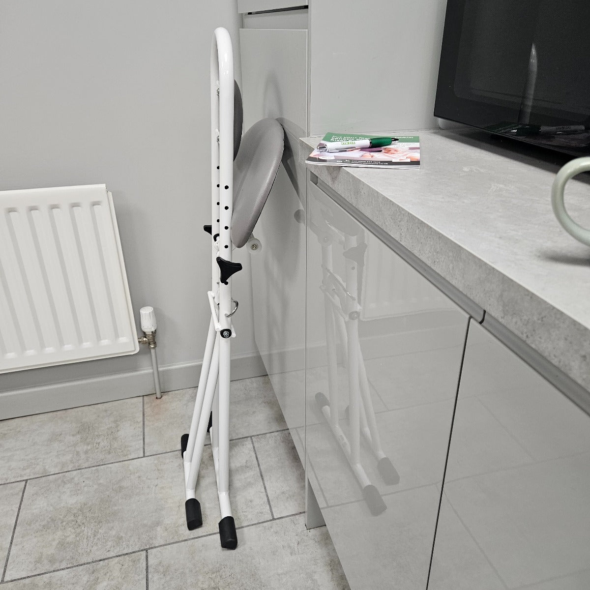 Folding perching stool