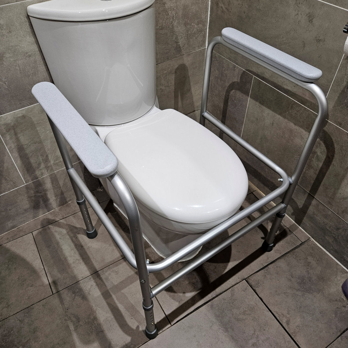 Toilet surround safety frame mobility aid with armrests - Height adjustable