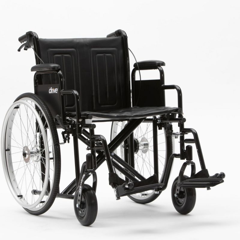 Black bariatric wheelchair with reinforced frame, wide seat, and elevated leg rests, designed for enhanced support and comfort.