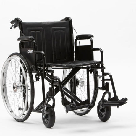 Black bariatric wheelchair with reinforced frame, wide seat, and elevated leg rests, designed for enhanced support and comfort.