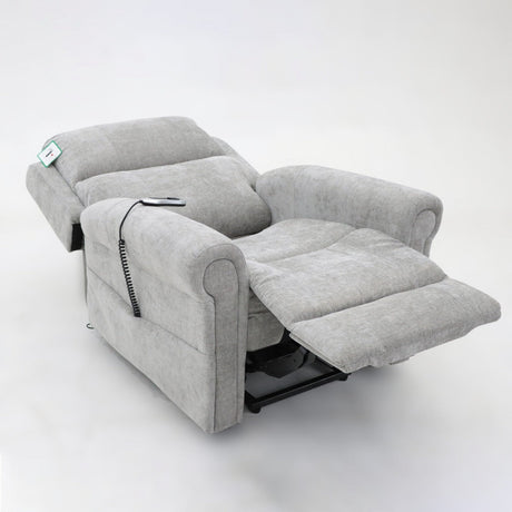 Heavy duty recliner chair in light grey fabric with extended footrest, padded cushioning and powered reclining function for superior comfort and support.