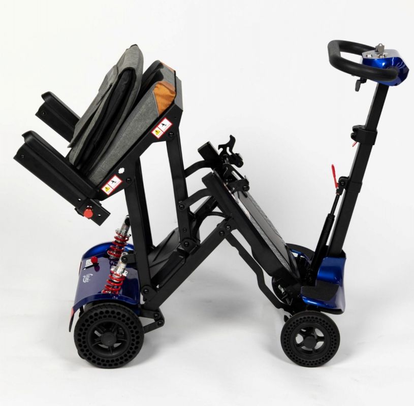 Compact folding disability scooter with a lightweight frame and ergonomic seat, designed for easy transport and storage.