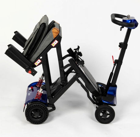 Compact folding disability scooter with a lightweight frame and ergonomic seat, designed for easy transport and storage.