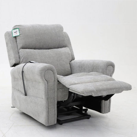 Modern large recliner chair in light grey fabric with extended footrest and remote control, designed for maximum comfort and support.