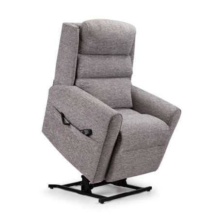 Electric recliner chair in textured grey fabric with lift-and-rise function, offering comfort and support for easier sitting and standing.