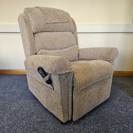 Gray recliner chair against a neutral wall