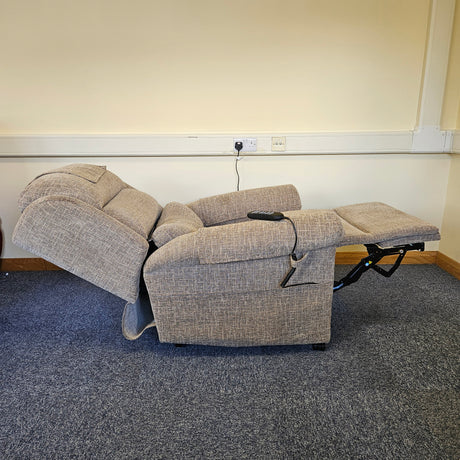 riser recliner on a carpeted floor against a white wall