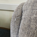 Close-up of textured fabric with a neutral colour palette.