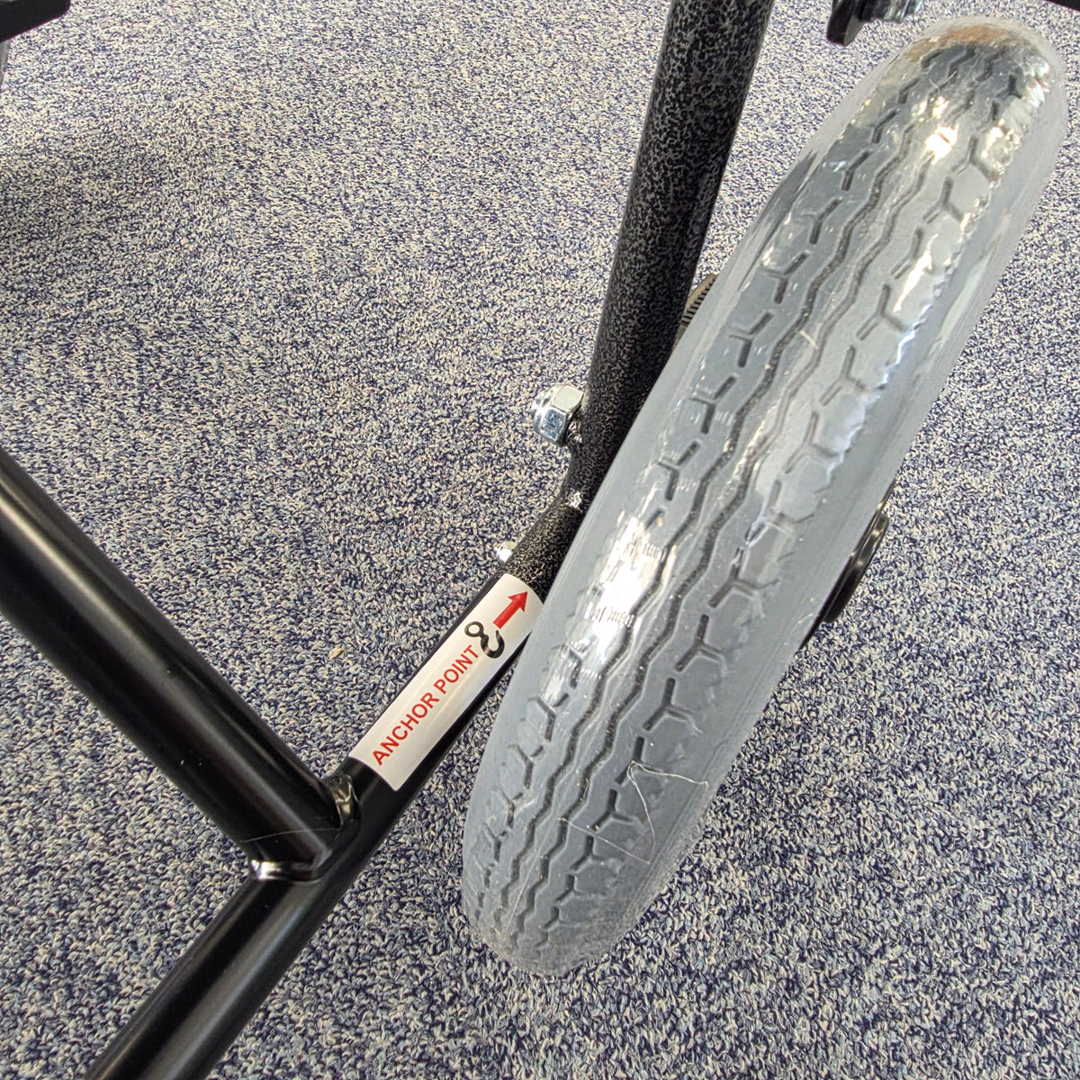 Crash tested wheelchair- Carer controlled suitable for use in a vehicle