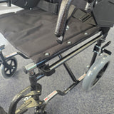 Crash tested wheelchair- Carer controlled suitable for use in a vehicle
