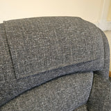 Close-up of gray textured fabric on a chair