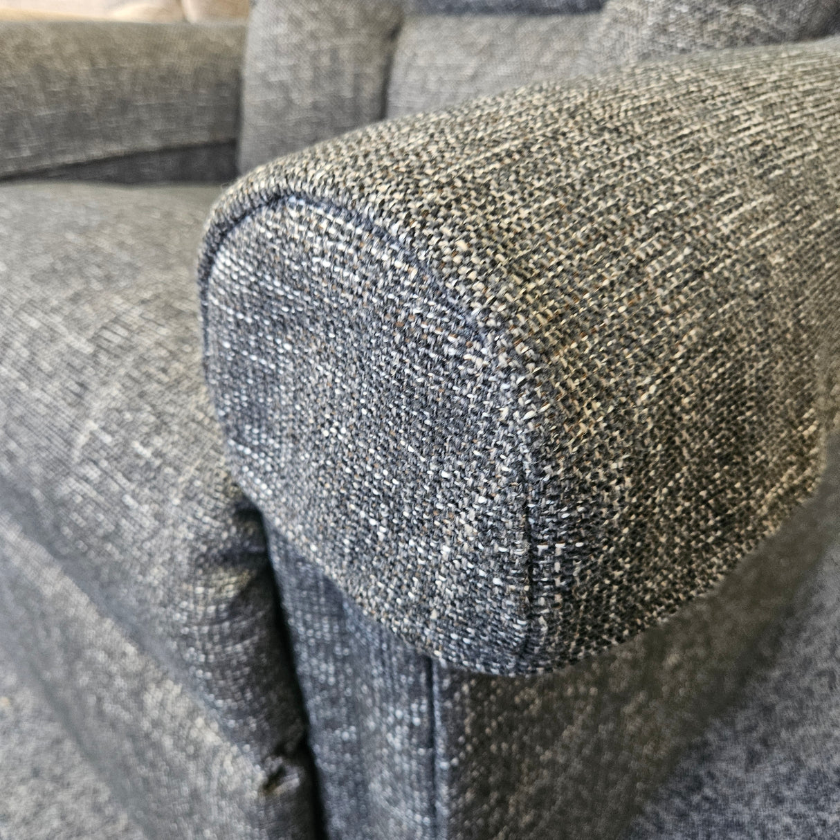 Close-up of a textured fabric with a focus on texture and color variation.