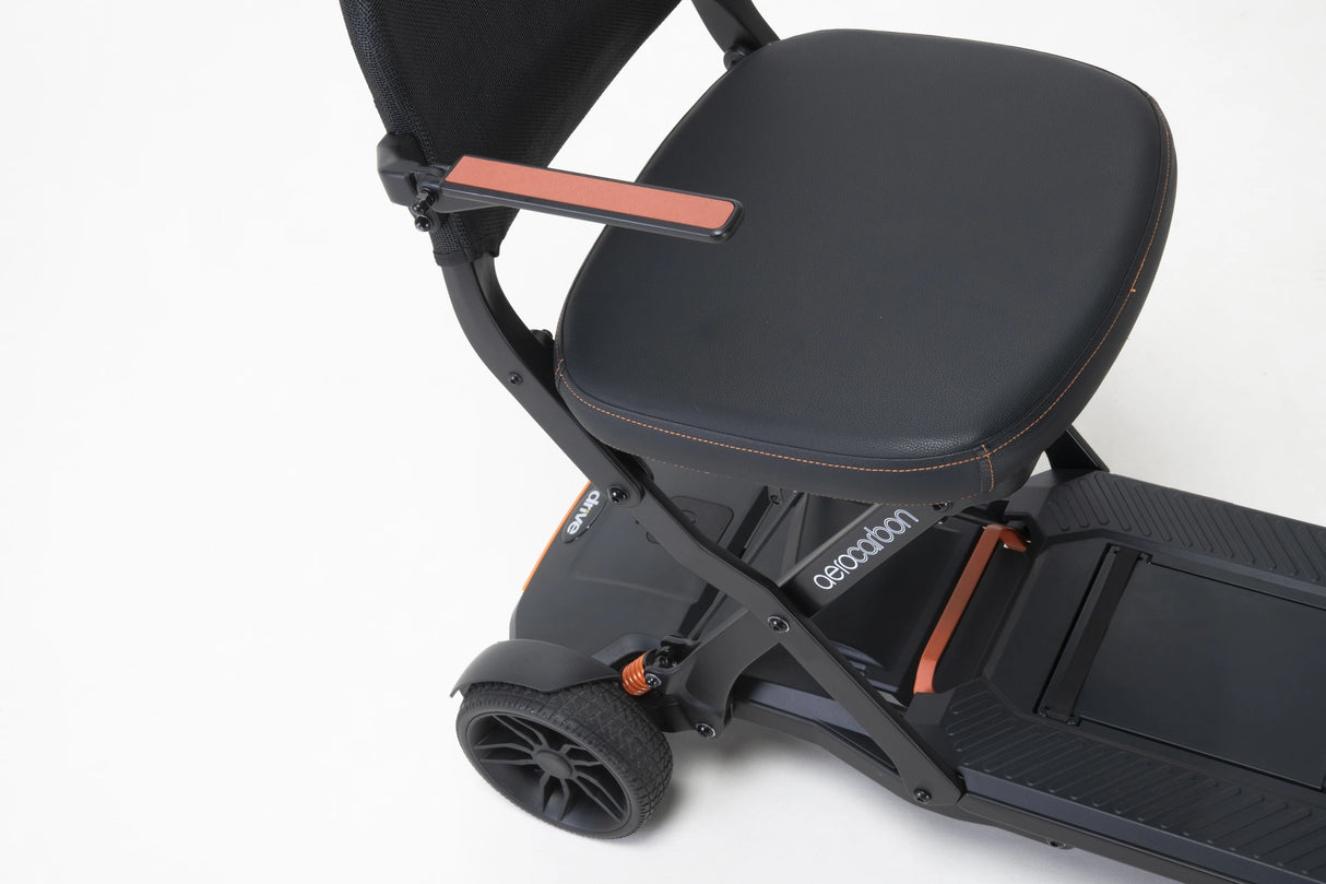 Black scooter with a seat on a white background