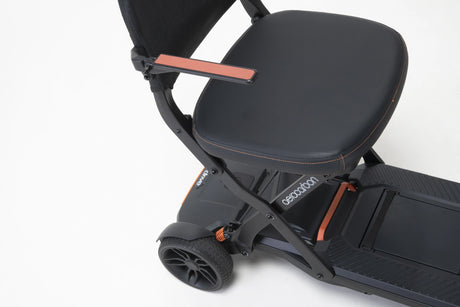 Black scooter with a seat on a white background