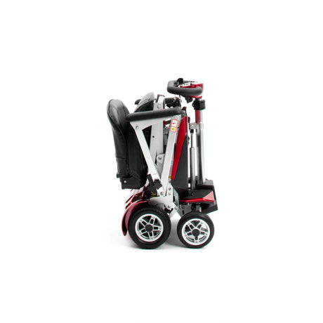 Foldable mobility scooter on a white background