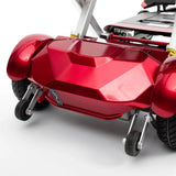 Close-up of a red mobility scooter on a white background