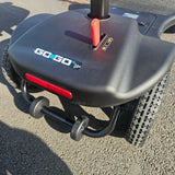 Close-up of a blue electric scooter with 'GoGo branding