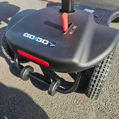 Close-up of a blue electric scooter with 'GoGo branding