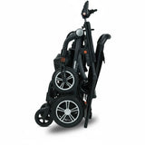 Folded wheelchair on a white background