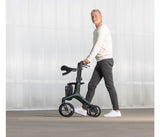 Man using a rollator in a minimalistic indoor setting