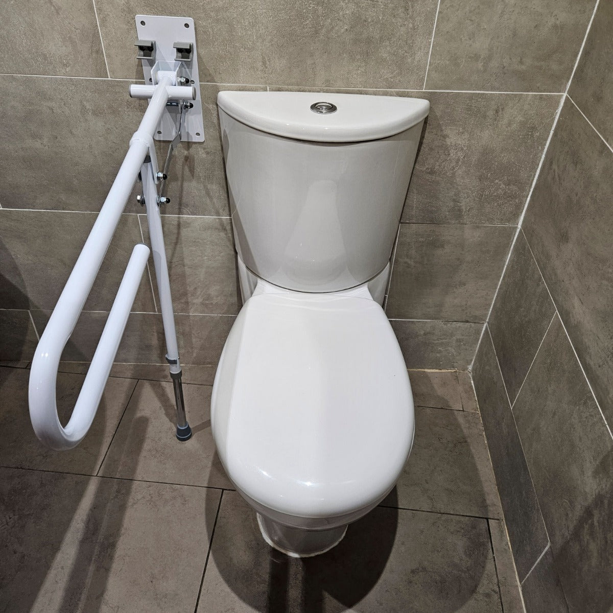 Folding drop down toilet bathroom safety rail with leg