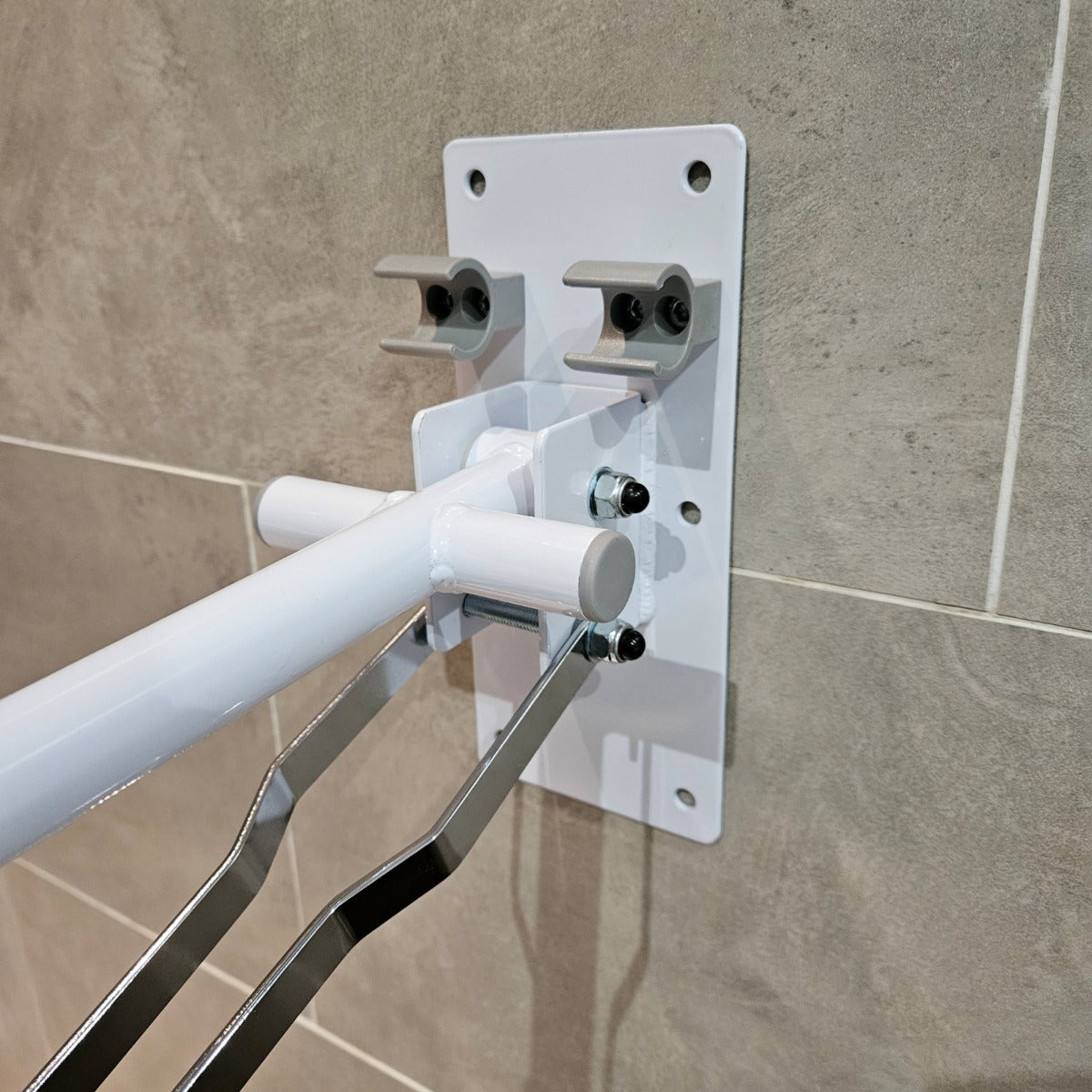 Folding drop down toilet bathroom safety rail with leg