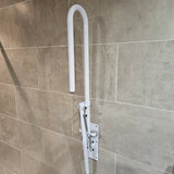 Folding drop down toilet bathroom safety rail with leg