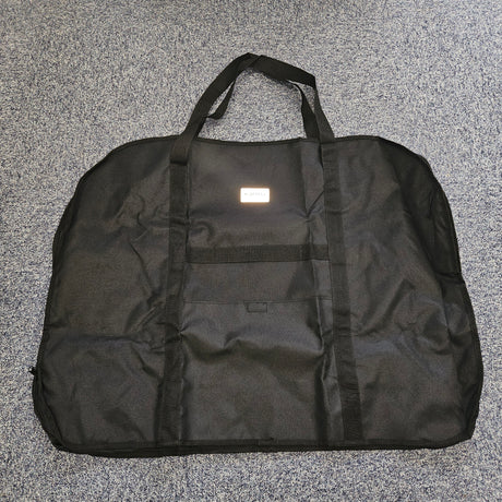 Black wheelchair bag on a gray textured surface