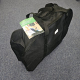 Black wheelchair bag on a gray surface