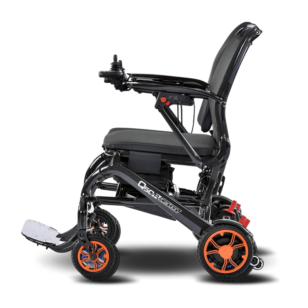 Black and orange mobility scooter on a transparent background