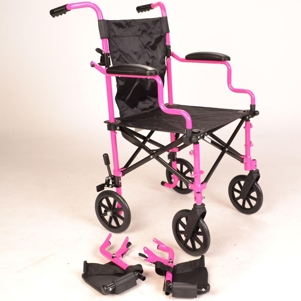 Lightweight compact Pink wheelchair in a bag