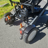 Close-up of a powerchair's rear wheels
