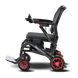 Black and red wheelchair on a blank background