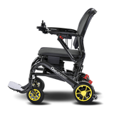 Black folding wheelchair with yellow wheels on a transparent background
